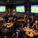 Experience the thrill of trực tiếp bóng đá PSG with passionate fans at a lively sports bar.