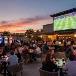 Patrons engaging in sports betting at outdoor casino venue, featuring ok365 discussions and lively atmosphere