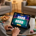 Player enjoys a strategic poker game on mb66-t tablet in cozy living room with snacks